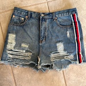 Signature8 distressed denim shorts with red white and blue stripe on both sides.